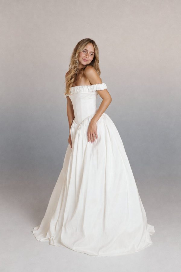 Benjamin wedding dress by Rara Avis, off-the-shoulder with a voluminous ivory skirt