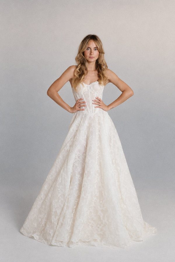 Rita floral lace wedding dress by Innocentia with long sleeves and a lace-edged veil